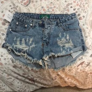 Distressed denim shorts
